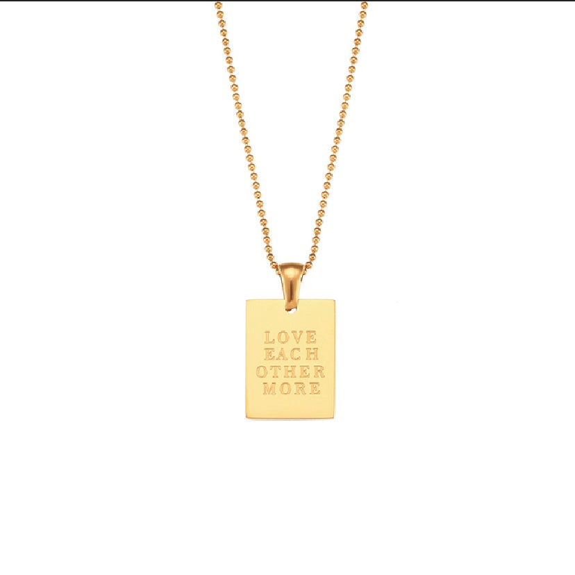 18k gold plated stainless steel affirmation tag pendant necklace on delicate ball chain with engraving options More Self Love, Made of Magic, Loved, and Breathe, hypoallergenic tarnish resistant meaningful gift necklace by The Intertwined Collective, Dallas Texas