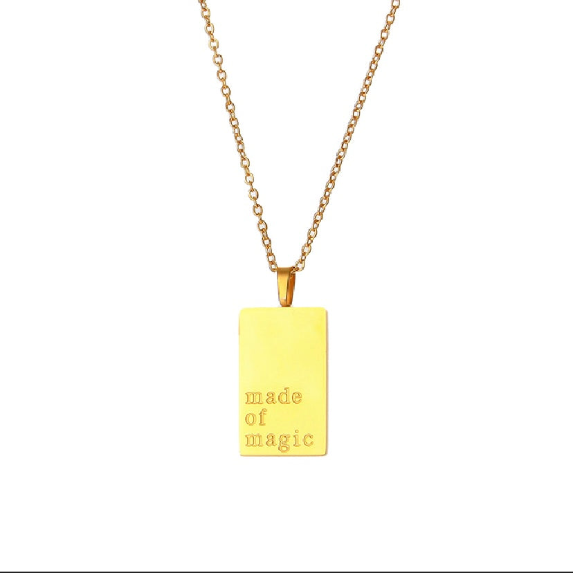 18k gold plated stainless steel affirmation tag pendant necklace on delicate ball chain with engraving options More Self Love, Made of Magic, Loved, and Breathe, hypoallergenic tarnish resistant meaningful gift necklace by The Intertwined Collective, Dallas Texas