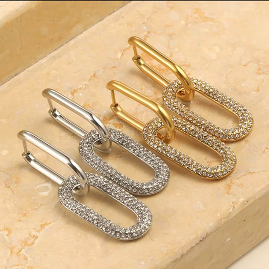 18k gold plated and silver tone stainless steel CZ pavé oval link drop hoop earrings in gold and silver, hypoallergenic tarnish resistant statement crystal drop earrings by The Intertwined Collective, Dallas Texas