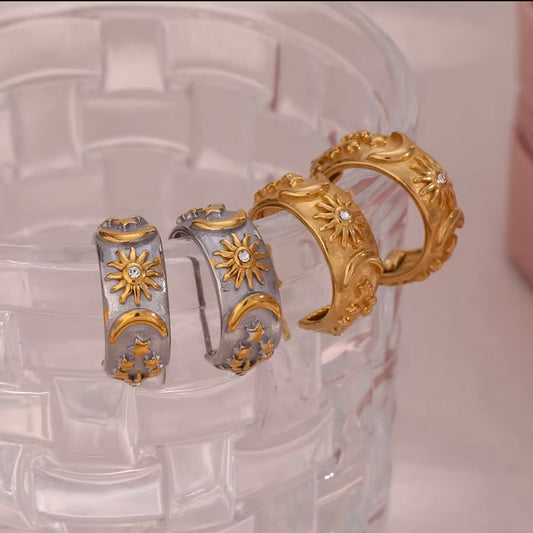 18k gold plated stainless steel celestial sun moon star wide band huggie hoop earrings with CZ accent in gold and two-tone gold silver, hypoallergenic tarnish resistant statement earrings by The Intertwined Collective, Dallas Texas