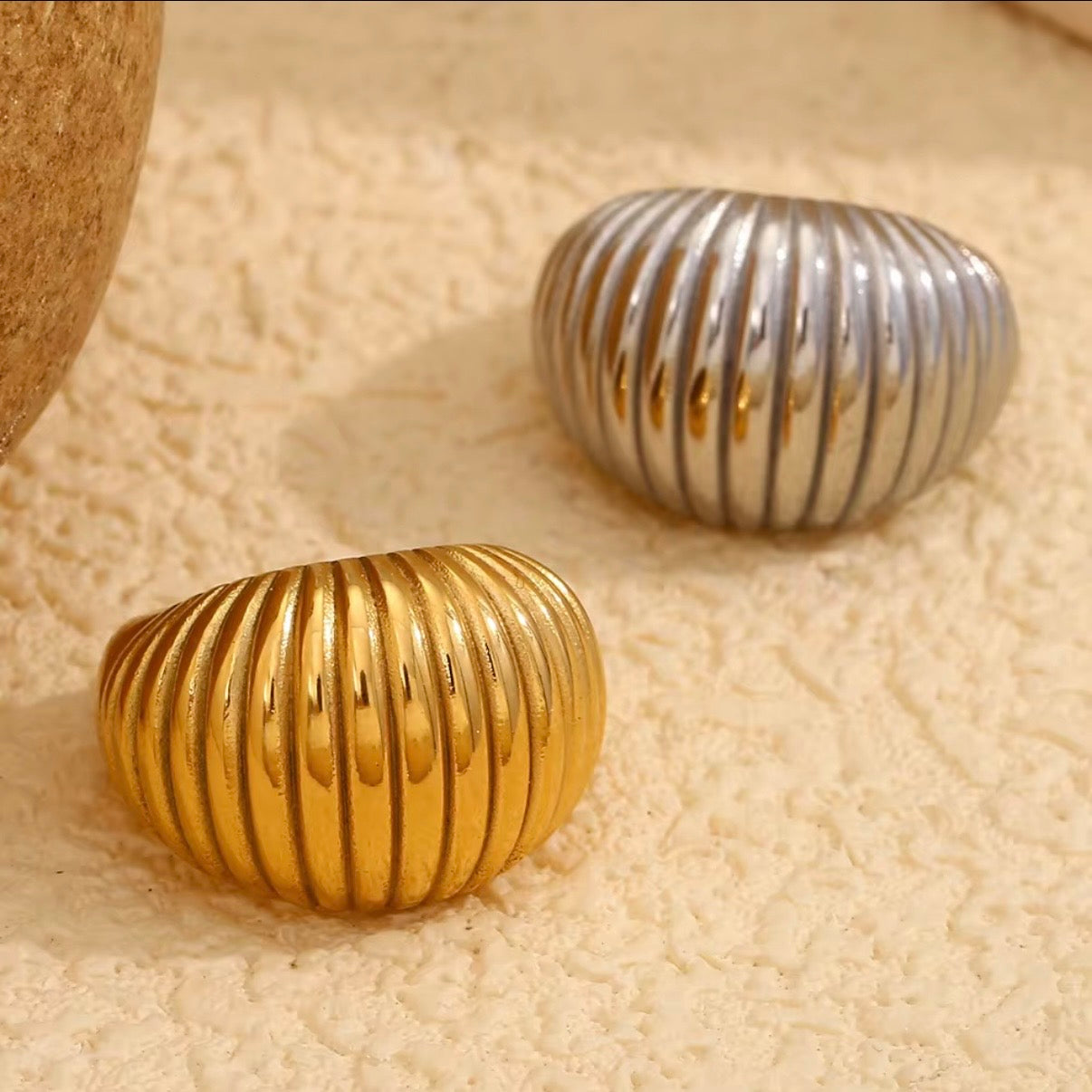 Wide ribbed dome statement ring in gold and silver tone stainless steel, hypoallergenic tarnish resistant sculptural stacking ring by The Intertwined Collective