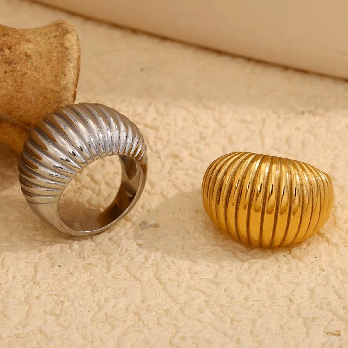 Wide ribbed dome statement ring in gold and silver tone stainless steel, hypoallergenic tarnish resistant sculptural stacking ring by The Intertwined Collective