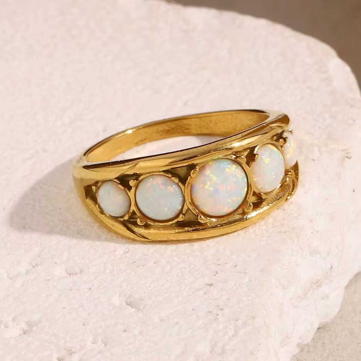 18k gold plated stainless steel graduated opal cabochon dome ring with open lattice prong setting, vintage-inspired iridescent opal statement ring by The Intertwined Collective