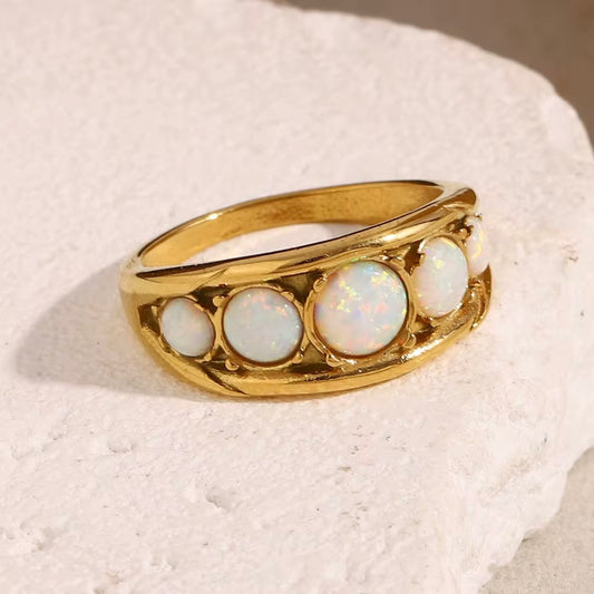 18k gold plated stainless steel graduated opal cabochon dome ring with open lattice prong setting, vintage-inspired iridescent opal statement ring by The Intertwined Collective