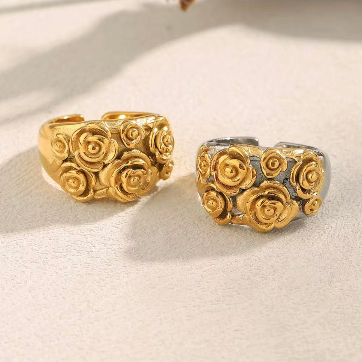 Wide dome open band ring with raised three-dimensional sculpted gold rose bouquet cluster, available in all-gold and two-tone gold and silver stainless steel, hypoallergenic tarnish resistant statement ring by The Intertwined Collective