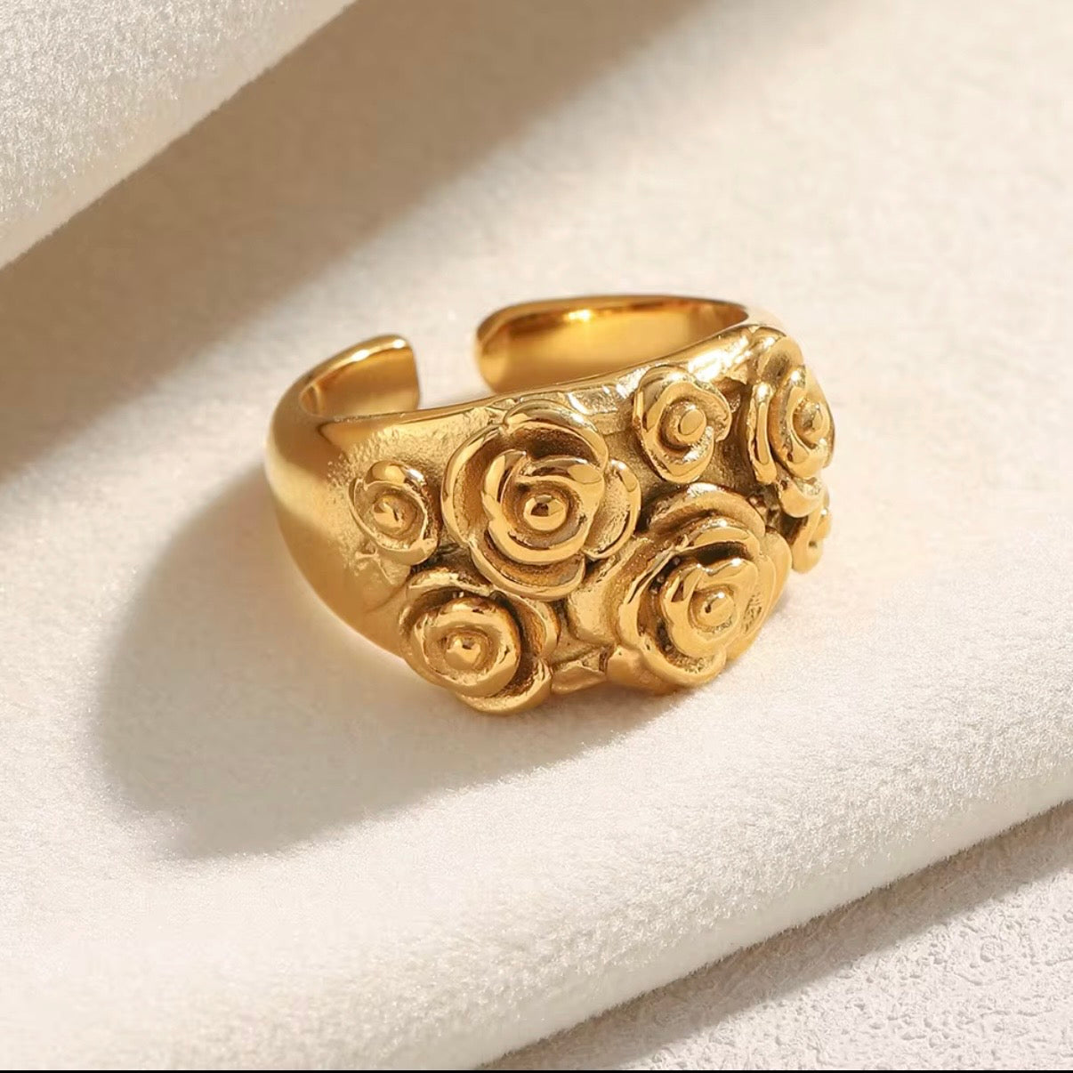 Wide dome open band ring with raised three-dimensional sculpted gold rose bouquet cluster, available in all-gold and two-tone gold and silver stainless steel, hypoallergenic tarnish resistant statement ring by The Intertwined Collective