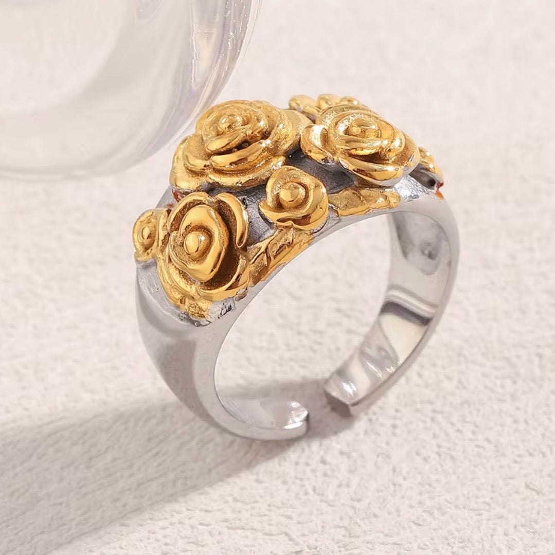 Wide dome open band ring with raised three-dimensional sculpted gold rose bouquet cluster, available in all-gold and two-tone gold and silver stainless steel, hypoallergenic tarnish resistant statement ring by The Intertwined Collective