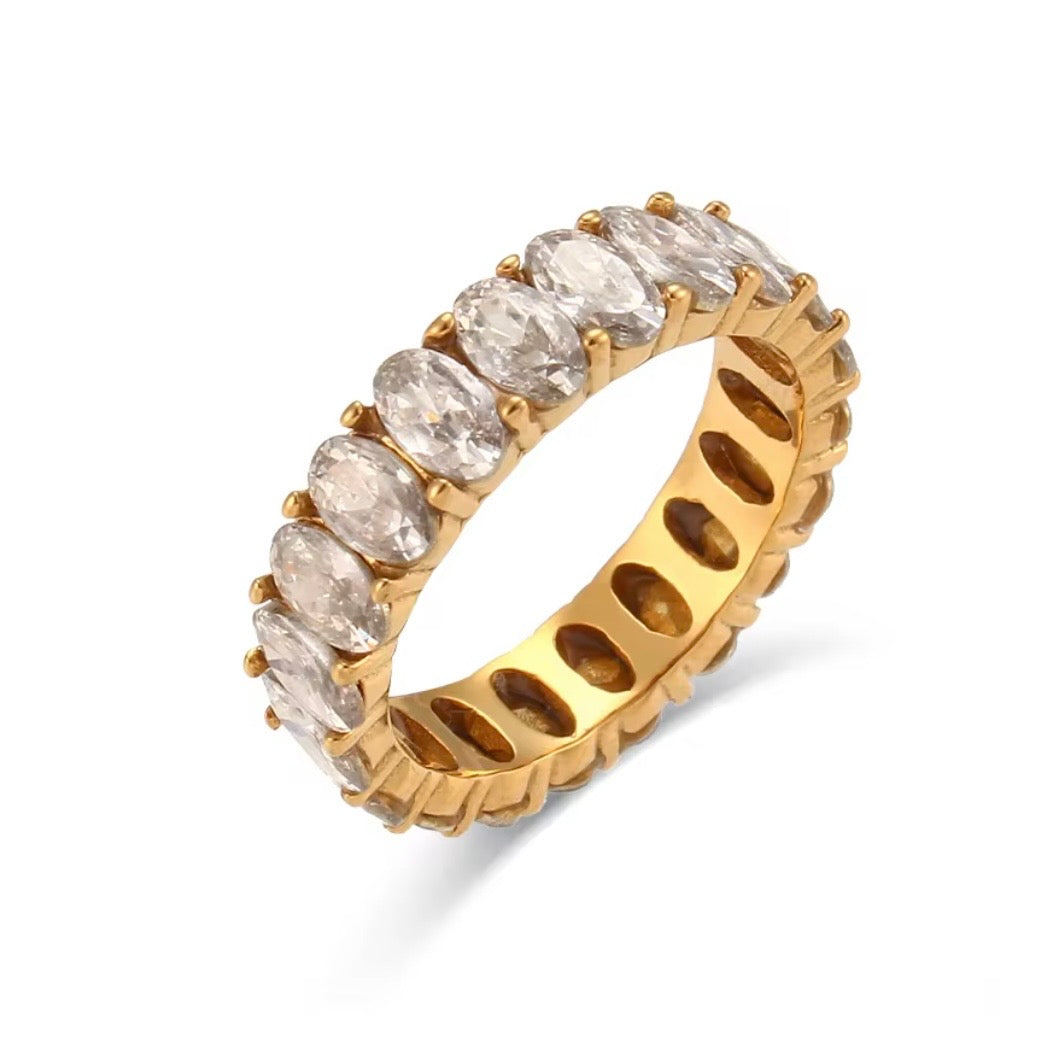 18k gold plated and silver tone stainless steel full eternity band ring with continuous prong-set oversized oval CZ stones, hypoallergenic tarnish resistant fine jewelry-inspired ring by The Intertwined Collective