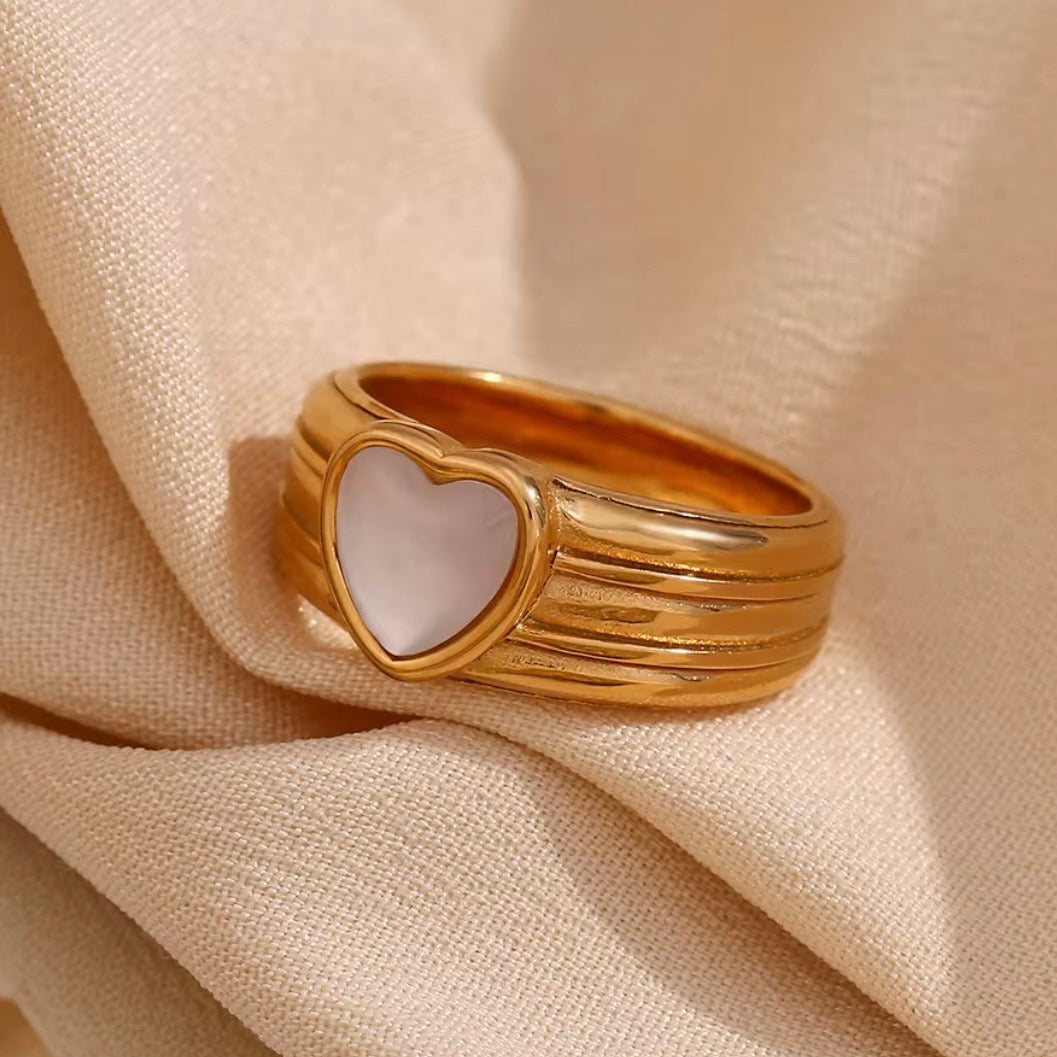 18k gold plated stainless steel wide dome signet ring with heart-shaped mother of pearl inlay and horizontal ribbed grooves, hypoallergenic tarnish resistant romantic statement ring by The Intertwined Collective