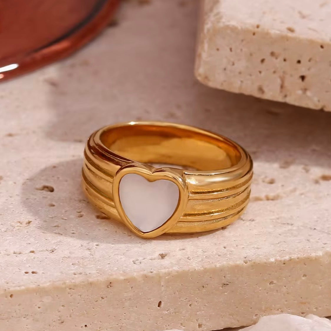 18k gold plated stainless steel wide dome signet ring with heart-shaped mother of pearl inlay and horizontal ribbed grooves, hypoallergenic tarnish resistant romantic statement ring by The Intertwined Collective