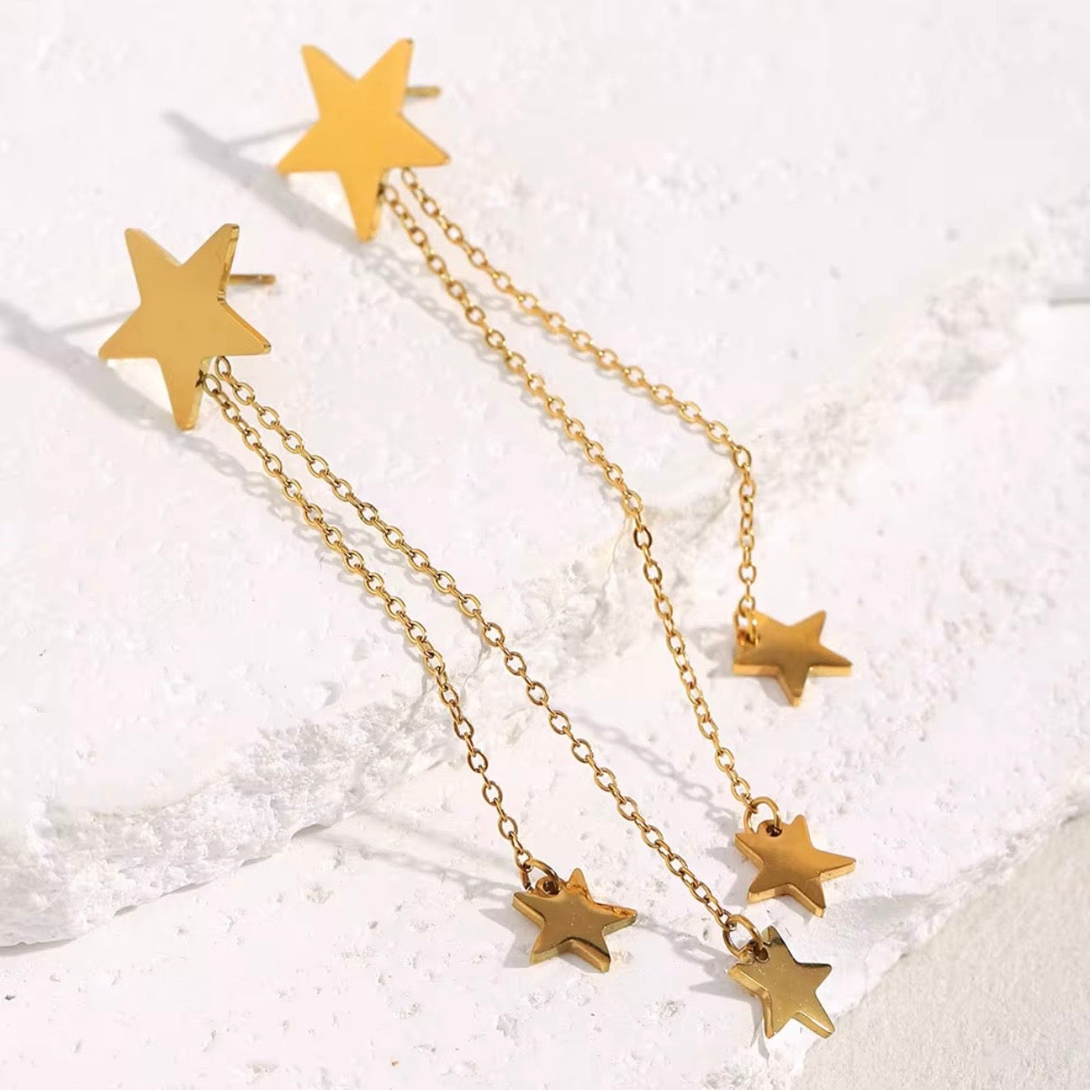 18k gold plated stainless steel star stud double chain fringe drop earrings with dangling star charms, hypoallergenic tarnish resistant celestial statement earrings by The Intertwined Collective