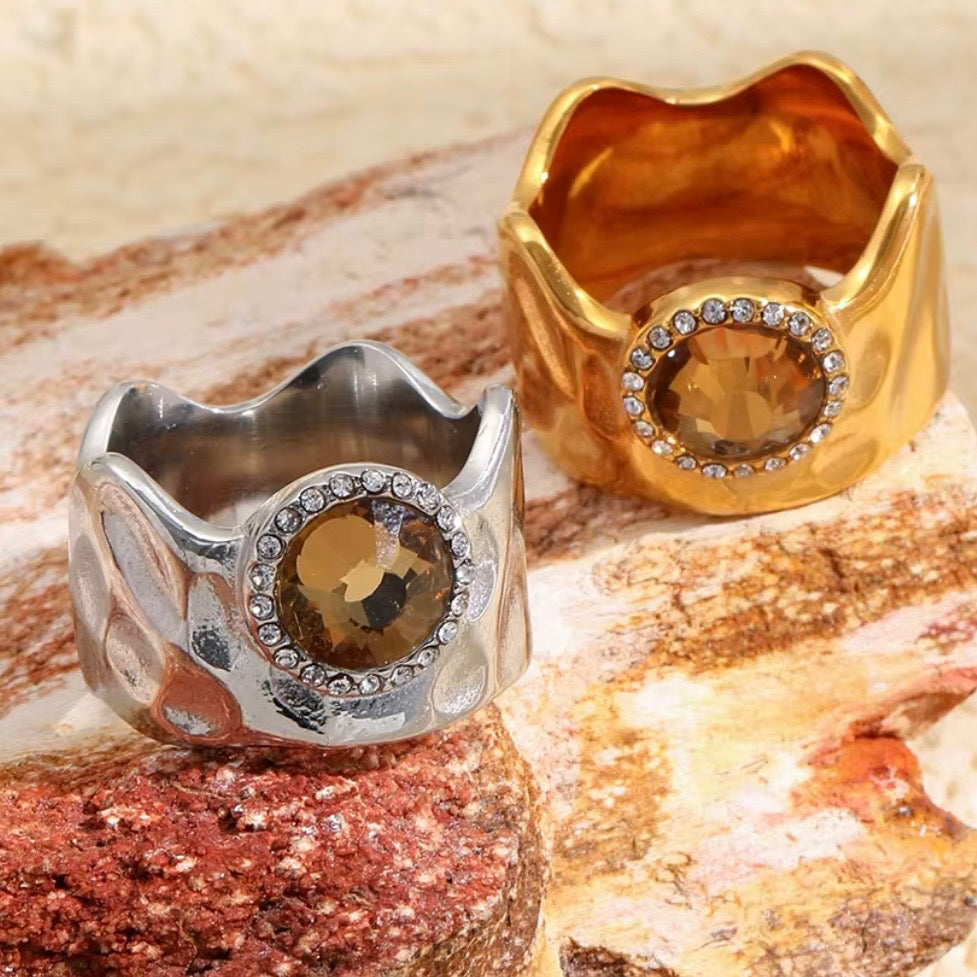 18k gold plated and silver tone stainless steel wide dome cocktail ring with large oval amber CZ center stone and round clear CZ halo, hypoallergenic tarnish resistant statement ring by The Intertwined Collective