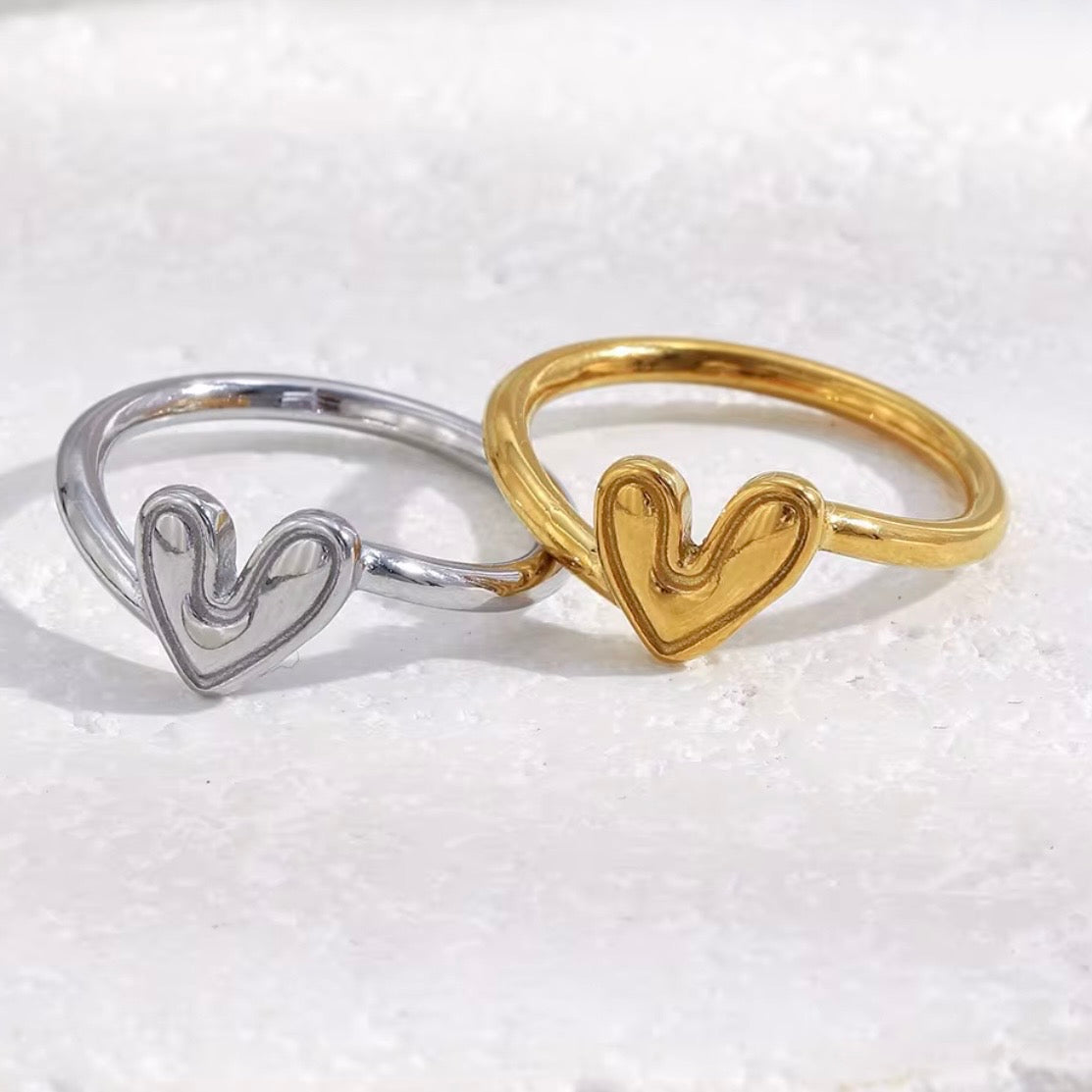 18k gold plated and silver tone stainless steel dainty molten heart band ring with raised organic hand-drawn style heart face, hypoallergenic tarnish resistant everyday romantic ring by The Intertwined Collective
