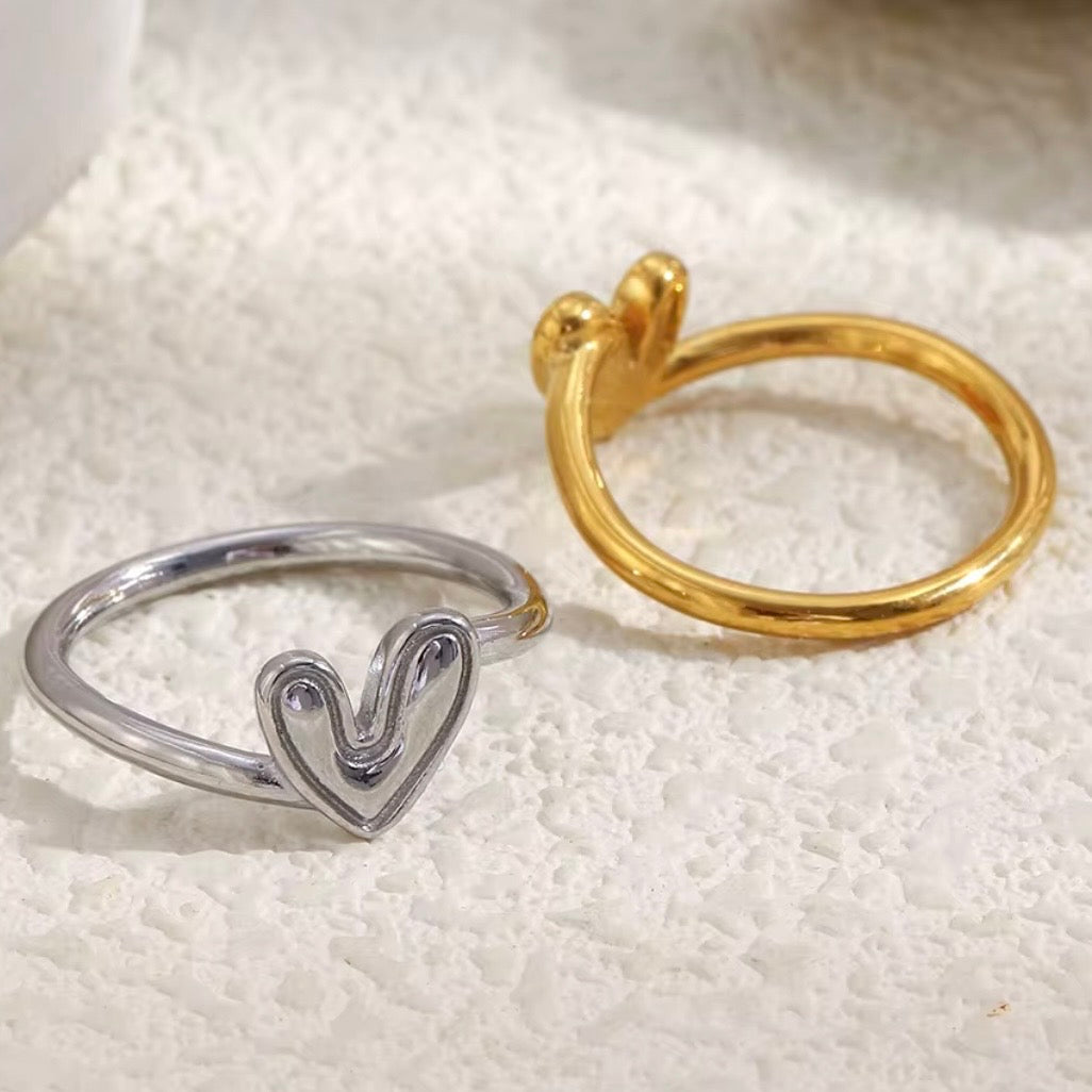 18k gold plated and silver tone stainless steel dainty molten heart band ring with raised organic hand-drawn style heart face, hypoallergenic tarnish resistant everyday romantic ring by The Intertwined Collective