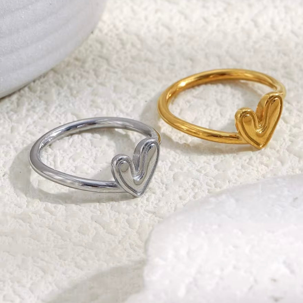 18k gold plated and silver tone stainless steel dainty molten heart band ring with raised organic hand-drawn style heart face, hypoallergenic tarnish resistant everyday romantic ring by The Intertwined Collective
