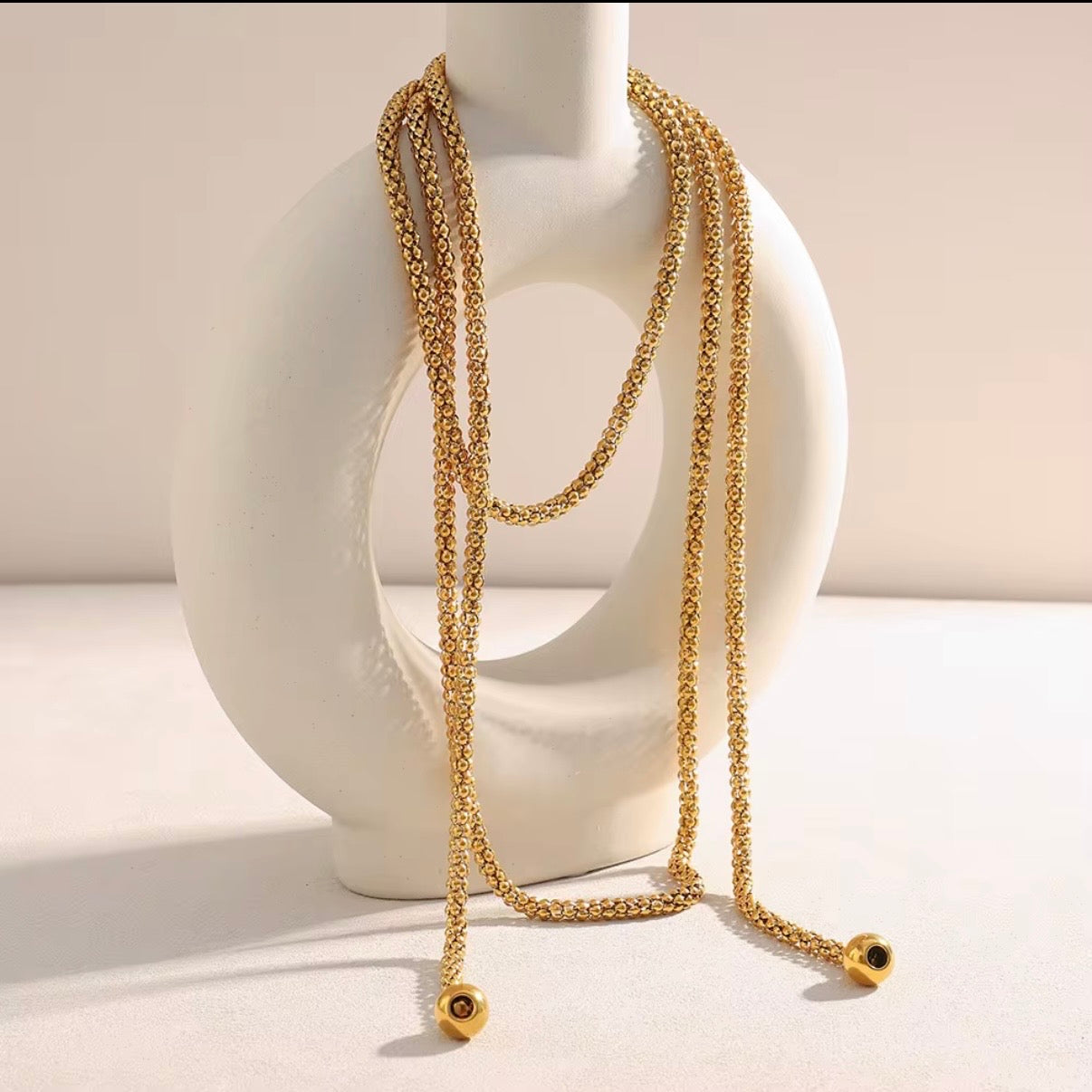 18k gold plated stainless steel long popcorn chain lariat necklace and belt with gold ball ends, 151cm / 59.4 inches, hypoallergenic tarnish resistant versatile chain accessory by The Intertwined Collective, Dallas Texas