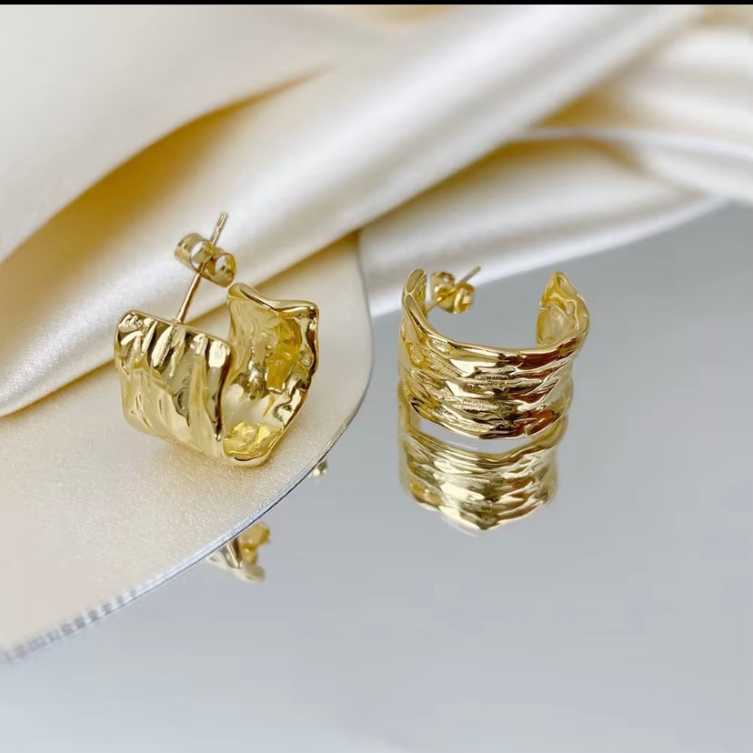 18k gold plated stainless steel molten hammered wide band C-hoop earrings with organic rippled texture, hypoallergenic tarnish resistant artisan statement earrings by The Intertwined Collective, Dallas Texas