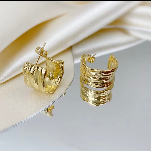 18k gold plated stainless steel molten hammered wide band C-hoop earrings with organic rippled texture, hypoallergenic tarnish resistant artisan statement earrings by The Intertwined Collective, Dallas Texas