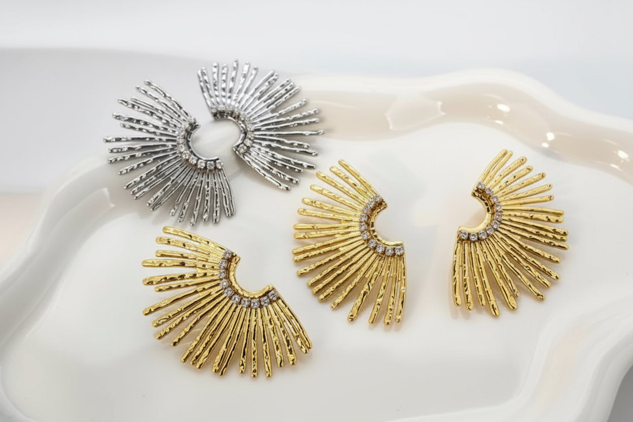18k gold plated and silver tone stainless steel oversized sunburst ray fan CZ pavé stud earrings in gold and silver, hypoallergenic tarnish resistant dramatic statement earrings by The Intertwined Collective, Dallas Texas