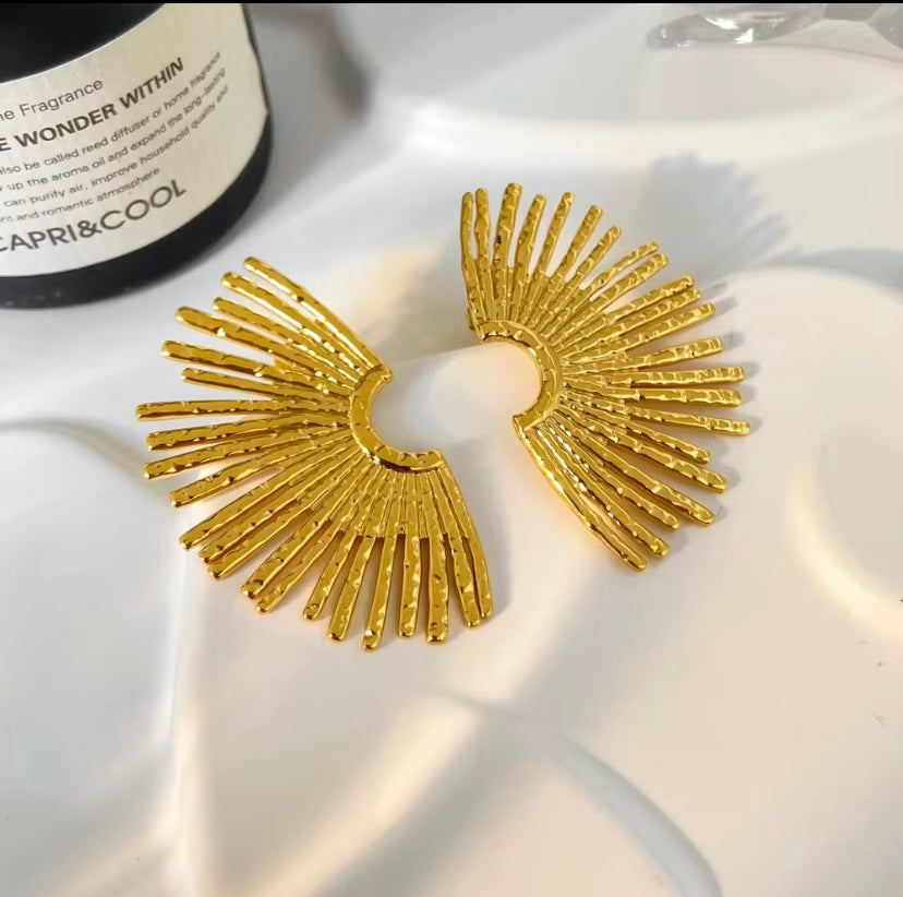 18k gold plated and silver tone stainless steel oversized sunburst ray fan stud earrings with hammered texture in gold and silver, hypoallergenic tarnish resistant artisan statement earrings by The Intertwined Collective, Dallas Texas
