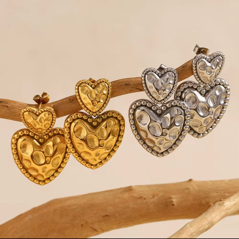 18k gold plated and silver tone stainless steel textured dot double heart drop earrings in gold and silver, hypoallergenic tarnish resistant statement heart earrings by The Intertwined Collective, Dallas Texas