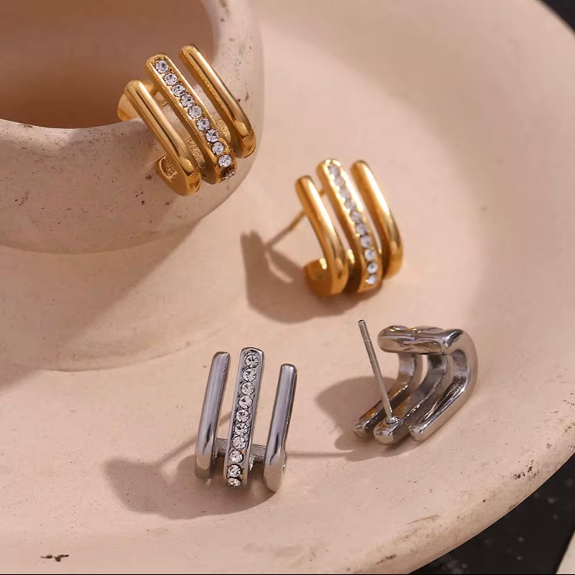 18k gold plated and silver tone stainless steel triple band CZ channel hoop earrings in gold and silver, hypoallergenic tarnish resistant modern statement earrings by The Intertwined Collective, Dallas Texas
