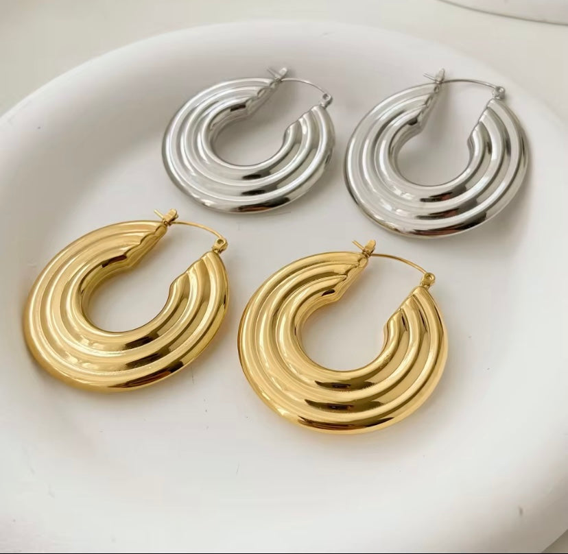 18k gold plated and silver tone stainless steel triple layer graduated hoop earrings in gold and silver, hypoallergenic tarnish resistant bold statement hoops by The Intertwined Collective, Dallas Texas